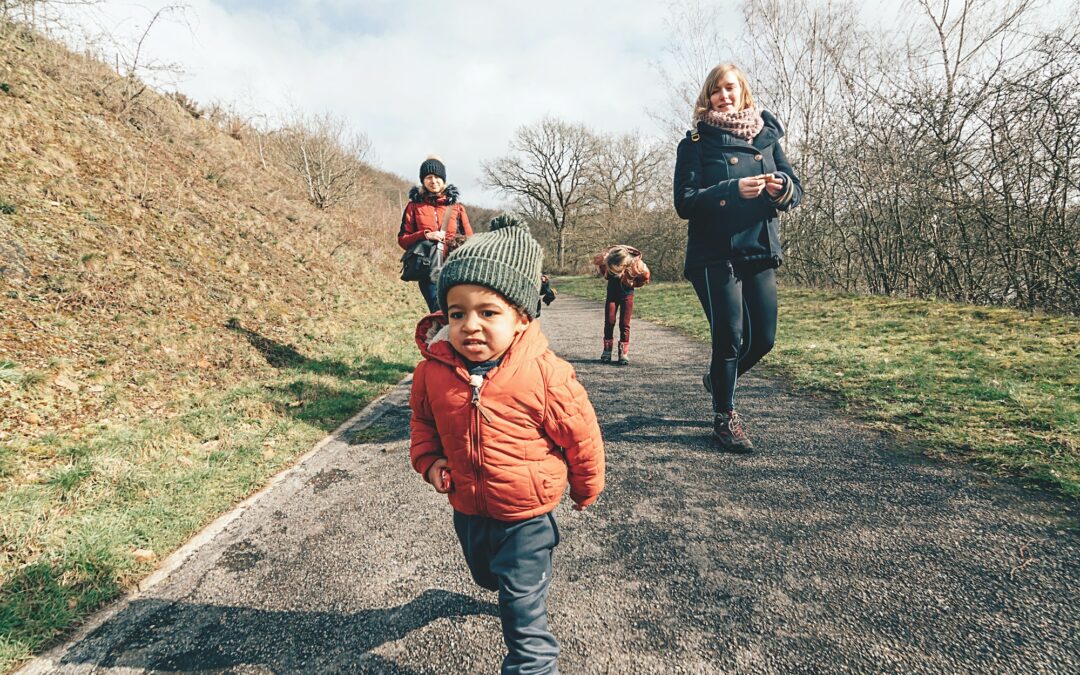 Mothers and children are out for a walk in nature